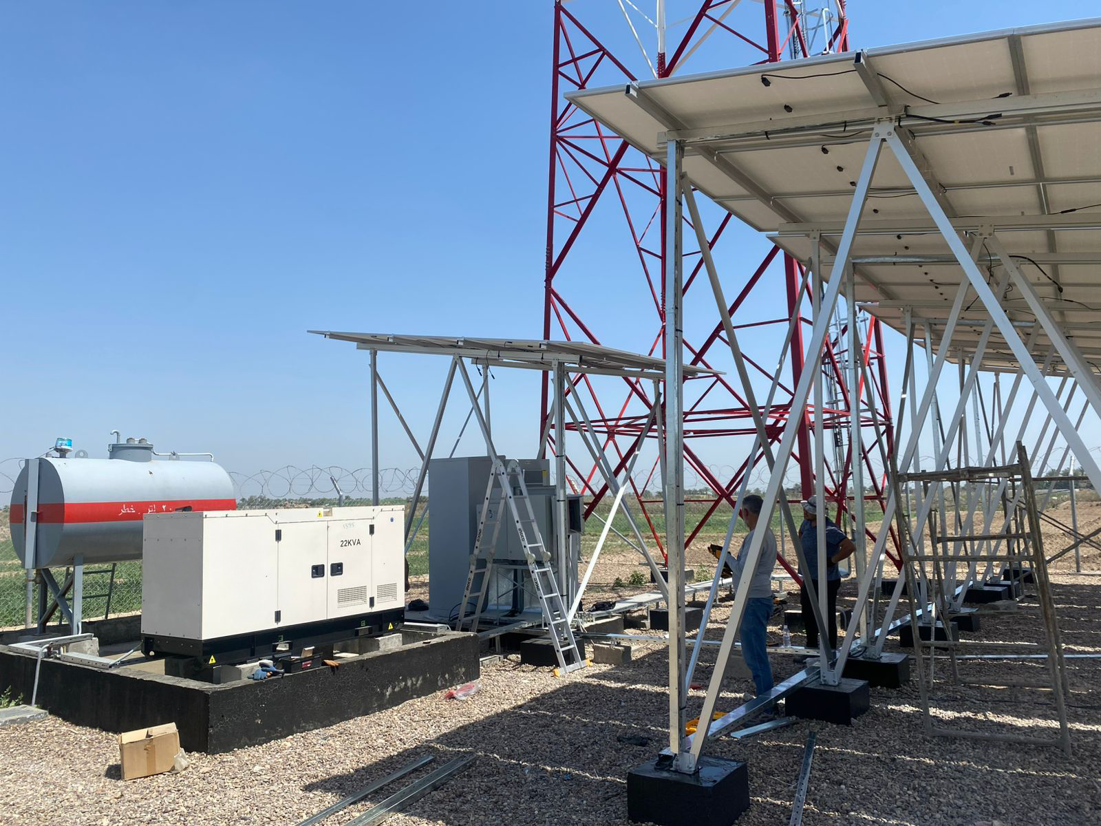 Engineers inspecting telecom tower infrastructure